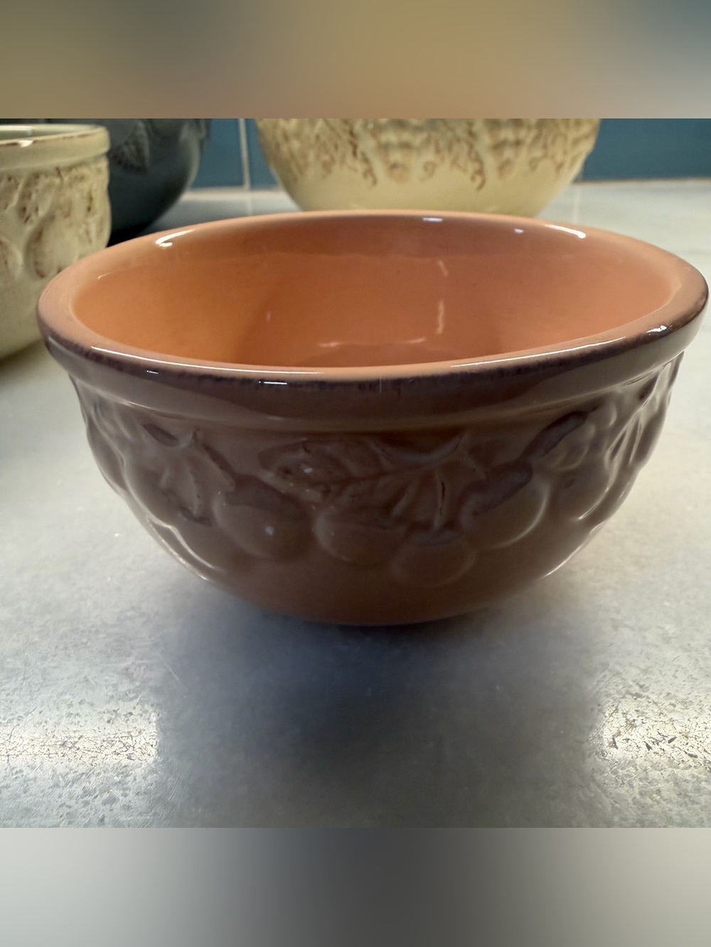 Signature Peach Ceramic Serving Bowl with Embossed Fruit Design